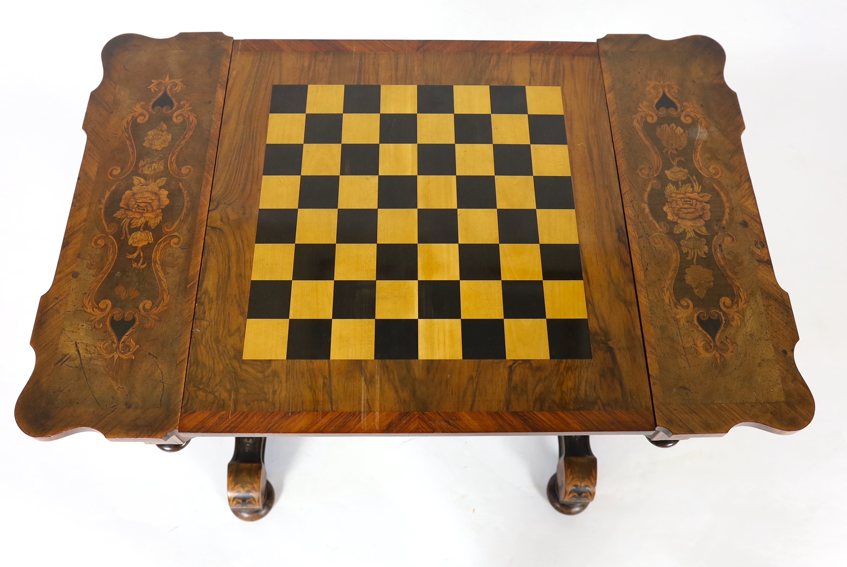 A 19th century French floral marquetry and tulipwood banded games table, 89cm wide, 58cm deep, 72cm high, Please note this lot attracts an additional import tax of 5% on the hammer price